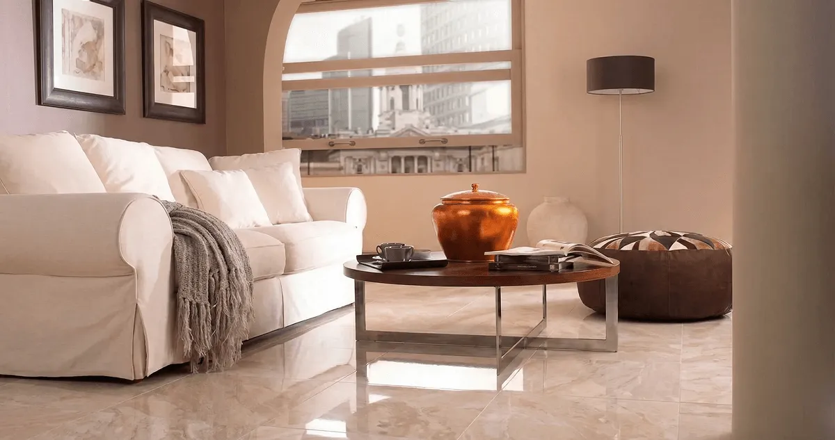 Modern living room with professionally installed marble flooring, a beige sofa, coffee table in Dayton, OH