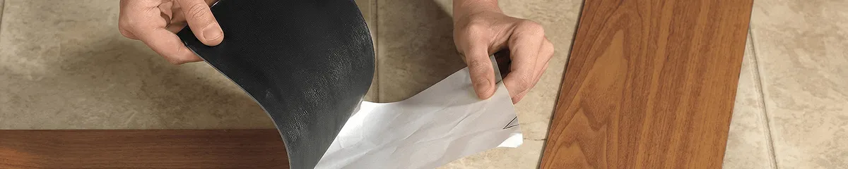 A professional installing vinyl flooring in Dayton, OH
